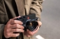 Preview: Lifestylebild Kamera in der Hand