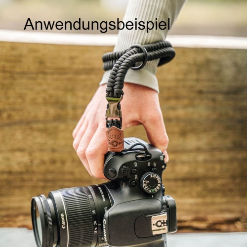Anwendungsbeispiel von der Handschlaufe an einer Kamera